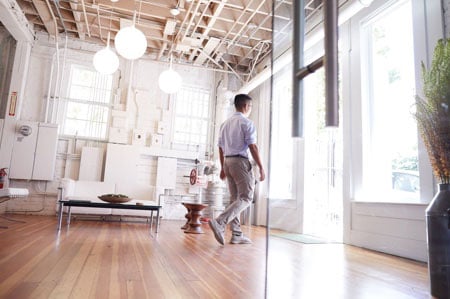 man walking outside office