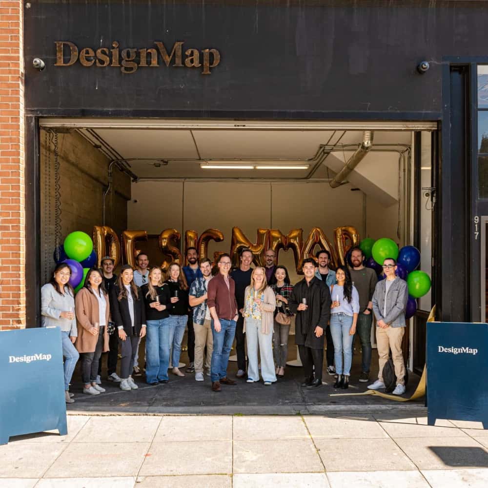 Team photo of Design Map celebrating